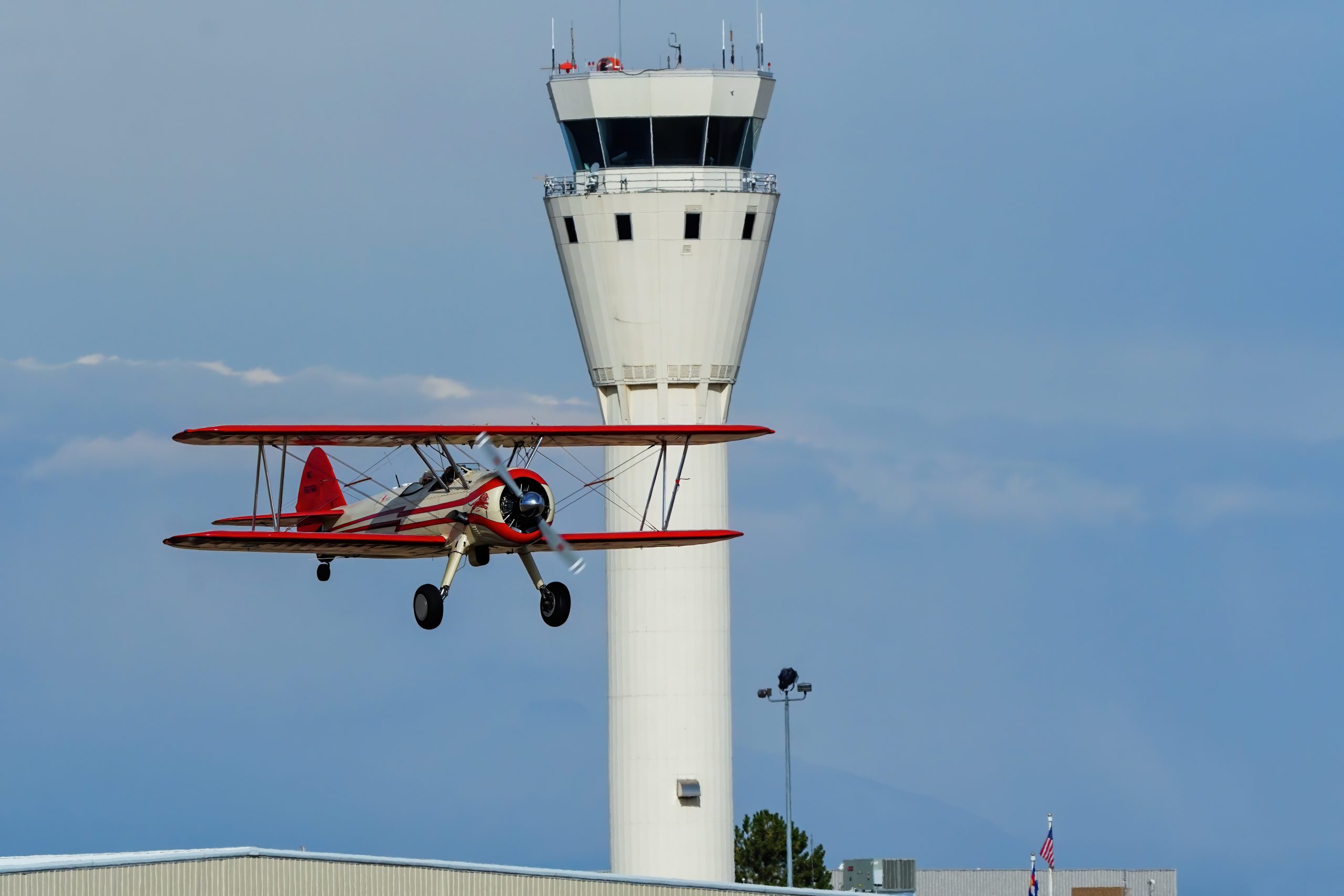 CENTENNIAL, USA-OCTOBER 17: Boeing Stearman airplane lands on October 17, 2020 at Centennial airport near Denver, Colorado. This airport is one of the busiest general aviation airports in the United States.