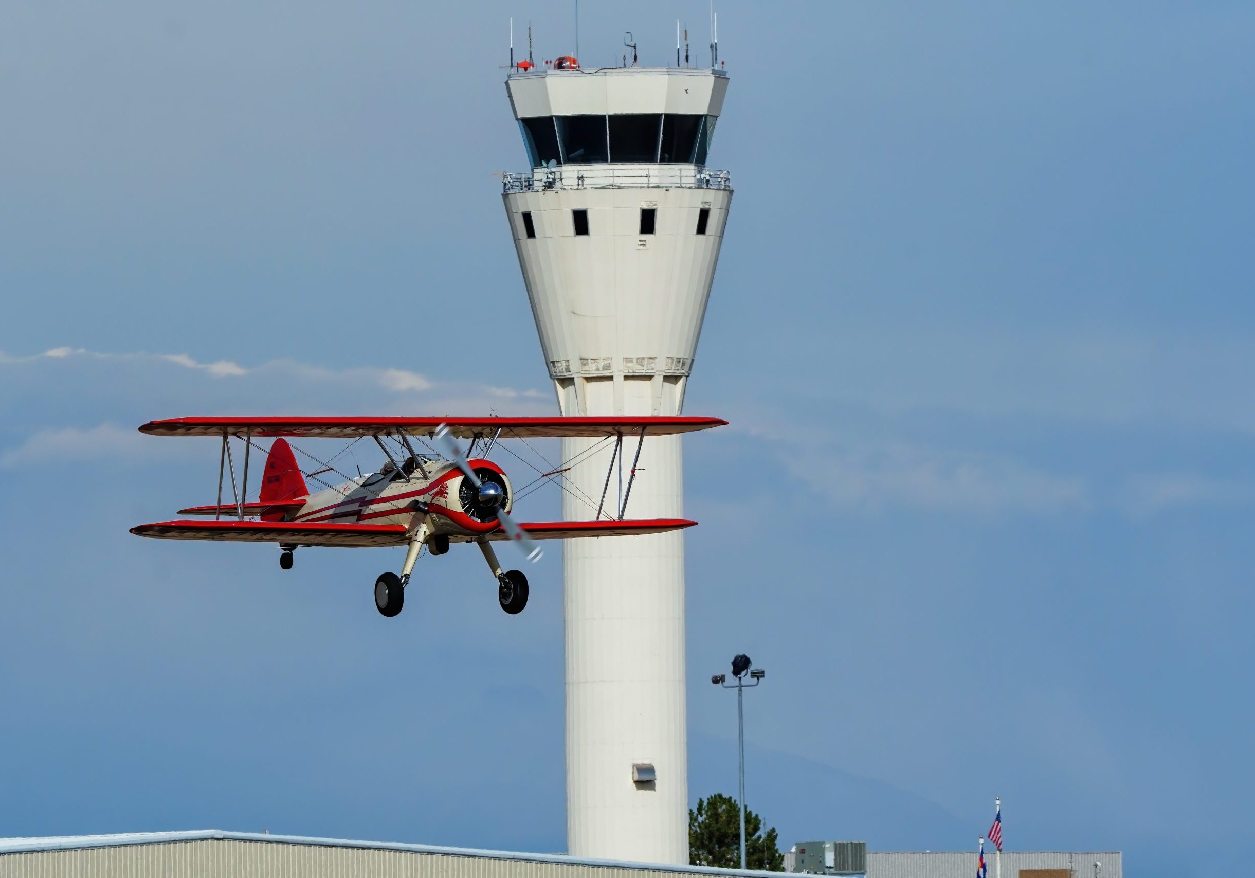 CENTENNIAL, USA-OCTOBER 17: Boeing Stearman airplane lands on October 17, 2020 at Centennial airport near Denver, Colorado. This airport is one of the busiest general aviation airports in the United States.